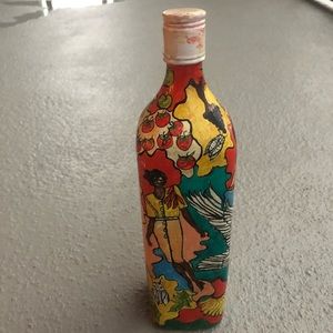 Unique hand painted one of a kind Jamaican Glass Bottle